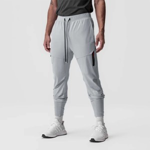 Pantalones deportivos de carga utilitarios para hombre, ideales para senderismo, camping y aventuras al aire libre con costuras reforzadas y bolsillos seguros - Product Image 1