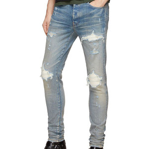 Jean déchiré durable pour homme, tissu extensible confortable avec un look usé tendance pour un style décontracté. - Product Image 1