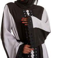 Vente en gros Robes brodées à manches longues et fermeture éclair pour femmes Abaya musulmane en dentelle Hijab pour le Moyen-Orient vêtements islamiques pour les pays arabes