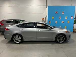 Ford Fusion 2020 Seminuevo en Excelente Estado, Interior Claro con Asientos de Piel, Motor Turbo, Llantas R18, Tracción Delantera - Product Image 3