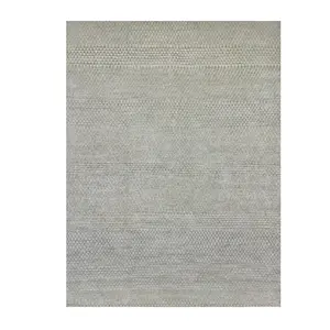购买柔软触感和纯色矩形区域地毯的手工打结羊毛地毯，用于地板装饰