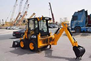 Chargeuse-pelleteuse compacte JCB 1CX neuve et d'occasion en stock, prête à être expédiée à bas prix, en parfait état de marche, à traction intégrale. - Product Image 3