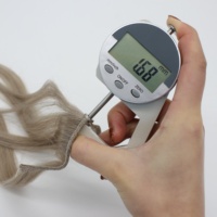 Perruques de luxe en cheveux humains tissés à la machine pour femmes blanches, perruque courte ondulée blond platine, vente en gros pour salons de beauté