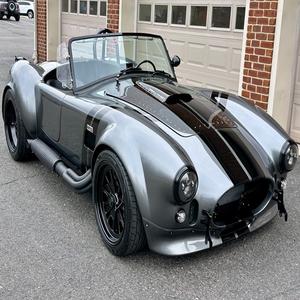 Perfectamente Limpio, 1965 Shelby Cobra, Modelo de Carreras, Transmisión Manual, Motor V8 - Product Image 1