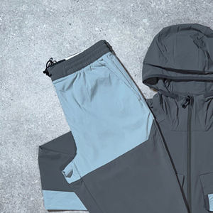 Chándal de nailon cortavientos con logotipo personalizado y cremallera para hombre, ropa de entrenamiento personalizada para correr, chaqueta cortavientos y pantalones de chándal - Product Image 3