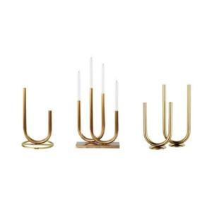 Portavelas de latón acabado a mano con ricos detalles decorativos y un lujoso acabado dorado bruñido para un atractivo clásico - Product Image 1