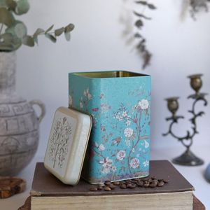 กระป๋องโลหะ1.6L ทรงสี่เหลี่ยมสีพาสเทลสีฟ้าลายดอกไม้105x105X160มม. สำหรับเก็บและถนอมอาหาร - Product Image 1