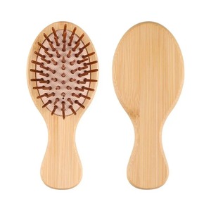 Petit manche en bambou brosse à cheveux pour bébé brosse à cheveux personnalisée OEM disponible le plus récent coussin en bambou en bois démêlant personnalisé et naturel - Product Image 1