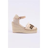 Espadrille fermée à talon compensé haut