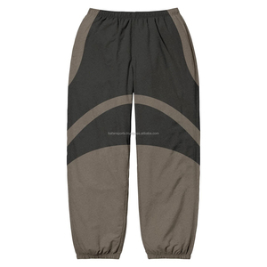Personalizado Casual impermeable al aire libre rompevientos pantalones de poliéster bordado en blanco pantalones de chándal de nailon para mujeres de alta calidad - Product Image 4