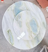Table à manger élégante en marbre bleu Maldives avec plateau tournant, table basse en marbre bleu lac et comptoir d'îlot design banquette