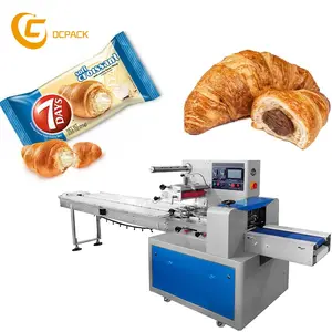 Mesin kemasan kue rol roti horisontal otomatis untuk mesin kemasan roti Croissant untuk sandwich