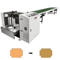Machine automatique d'alimentation et de collage pour la fabrication de boîtes rigides en carton et de boîtes cadeaux