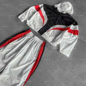 Conjunto Deportivo de Dos Piezas para Hombre en Poliéster, Chaqueta de Nailon con Cierre y Pantalones Deportivos, Chaqueta Cortavientos Personalizada de Nailon de Alta Calidad - Product Image 1