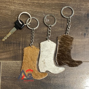 Nouvel arrivage de porte-clés en cuir de vachette au design unique porte-clés en cuir de fourrure véritable porte-clés élégants porte-clés de haute qualité à vendre - Product Image 1