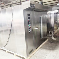 Four de cuisson rotatif à gaz électrique professionnel à 64 plateaux Conception à 2 chariots pour l'usine de boulangerie Utilisation de la matière première de maïs de fruits