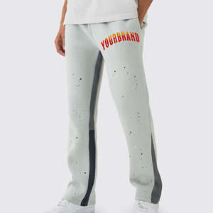 กางเกงวอร์มผู้ชายแบบสีบล็อก คุณภาพสูง กางเกงจ็อกเกอร์สั่งทำพิเศษ ผ้าฟลีซหนานุ่ม สีพื้น ทรงขาบานหลวม สไตล์ OEM - Product Image 1