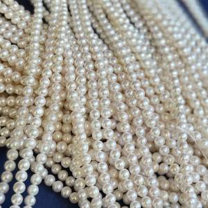 ไข่มุกน้ำจืดเกรด AAA ความเงางามสูง รูปทรงสังเคราะห์ สีขาว ขนาด 5-10 มม. ความยาว 15.5 นิ้ว บรรจุแบบมัด ตรวจสอบโดยผู้เชี่ยวชาญ บรรจุภัณฑ์แบบขายส่ง - Product Image 4