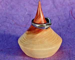 Aesthetic wooden ring <b>holder</b> is a perfect blend Handcrafted from natural wood it features a smooth tapered stand stacking rings - Product Image 3