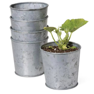 Maceta redonda galvanizada con un diseño elegante para ajustes de decoración del hogar modernos y rústicos elegantes - Product Image 1