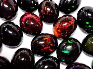 Ópalo etíope negro ovalado liso de alto grado de gran tamaño 10X8MM proveedor al por mayor cabujón de Fuego Negro ópalo etíope piedra preciosa OEM - Product Image 2