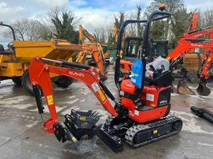 Miniexcavadora Kubota U10-5 tipo oruga, color rojo, con accesorio rompedor de rocas Daemo B50, precio asequible, en venta. - Product Image 6