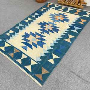 Alfombra Turca Vintage de 4.6x6.9 pies, Alfombra Azul con Diseño Floral de Lana - Product Image 1