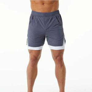 Plus lisse et plus doux 80% Nylon 20% élasthanne moka hommes Compression doublé tissé baggy entraînement court avec poches avant - Product Image 1