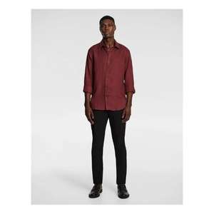 Chemise élégante à manches longues pour homme, conçue pour les journées de travail professionnelles et les soirées décontractées, avec un design épuré et un confort durable. - Product Image 4