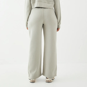 Article tendance : Pantalon de survêtement en polaire pour femme, en polyester et coton, taille élastique, logo imprimé personnalisé, couleur unie, côté - Product Image 2