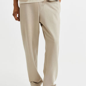 Pantalones de chándal acampanados Bootcut de cintura media personalizados con borde de corte bordado de ropa de calle para dobladillo crudo patrón recto diseño acampanado - Product Image 3