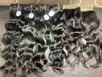 Direct de l'usine Cuticule de cheveux humains ondulés indiens bruts alignés prêt à expédier avec des prix de gros pour l'expédition dans le monde entier
