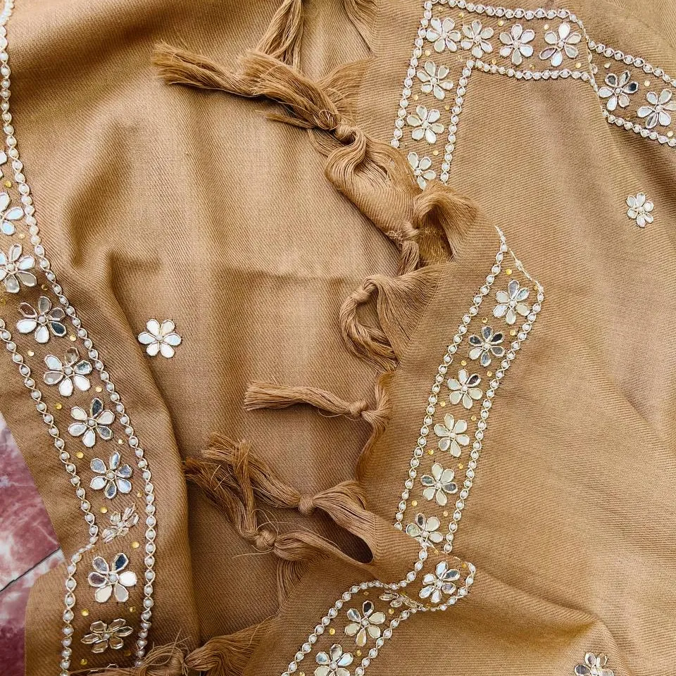 Exquisitely detailed and elegant handwork stoles/shawls manufactured in India in a variety of floral themes on 100% wool fabric