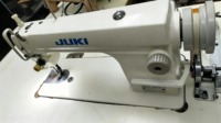 Machine à coudre industrielle à point droit simple aiguille JUKI DDL-8500 d'occasion pour vêtements