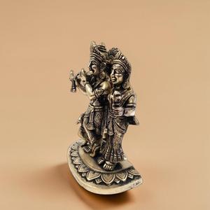 Paire de statues d'idoles Radha Krishna en laiton de 21cm pour les fêtes de mariage ou de Diwali - Product Image 1