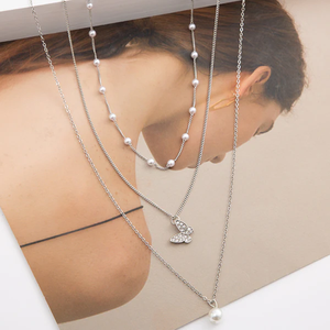 Nouvel arrivage de bijoux ras du cou multicouches à la mode Collier ras du cou avec pendentif et chaîne en alliage de perles Collier pour femmes - Product Image 5