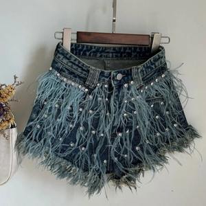 Pantalones cortos de mezclilla desgastados personalizados de alta calidad, pantalones cortos de verano con estilo para mujer, pantalones cortos de mujer con estampado de piedra 2025 - Product Image 1