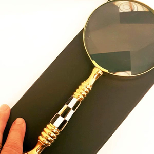 Loupe en laiton doré poli avec artisanat artistique parfait pour les amoureux de la décoration chic et raffinée - Product Image 1