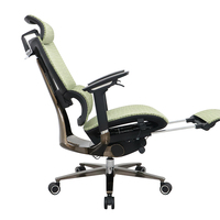 Chaise de bureau ergonomique en maille à dossier haut pivotant pour fonctions de direction, verte, avec repose-pieds.