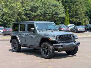 Jeep Wrangler 4 portes 4x4 SUV 2024 d'occasion, conduite à gauche, intérieur foncé, sièges en tissu, transmission automatique, électrique, jantes R19 - Product Image 2