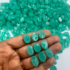 Piedra preciosa suelta de cabujón de forma ovalada de Calcedonia Aqua sintética de alta calidad para la fabricación de joyas precio al por mayor - Product Image 1