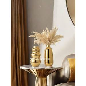 Vente en gros de table de luxe en métal de qualité pour la maison Vases à fleurs décoratifs Vases à fleurs au design moderne poli or à un prix raisonnable - Product Image 1