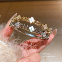 Bracelet en acier inoxydable haut de gamme délicat Zircon fleur plaqué pour femme accessoire de mode à la mode pour une tenue de fête quotidienne