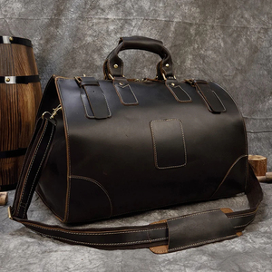 Sac de voyage en cuir noir avec fermeture à glissière pour les voyages - Product Image 1