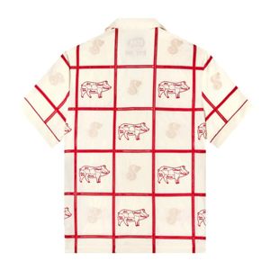 La camisa de Sopranos Satriale presenta cortes de cerdo etiquetados, bordados personalizados y popelina de algodón orgánico para un estilo ventoso - Product Image 2