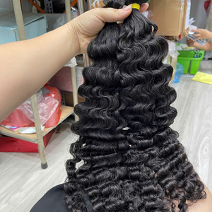 Vente en gros d'extensions de cheveux humains Remy vietnamiens bruts paquets de cheveux de trame bouclés à double étirage - Product Image 3