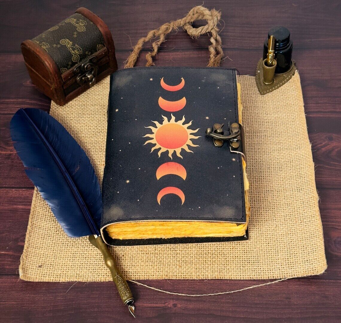 Записная книжка с изображением Солнца и Луны