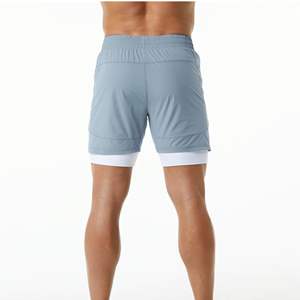 Pantalón corto de entrenamiento para hombre, tejido forrado de compresión con bolsillos delanteros, 80% nailon, 20% elastano, antiniebla, azul, más suave - Product Image 4