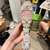 Brosse à cheveux vietnamienne en coquillages marins avec de vrais coquillages marins et un élégant nœud pour cadeau et soins personnels