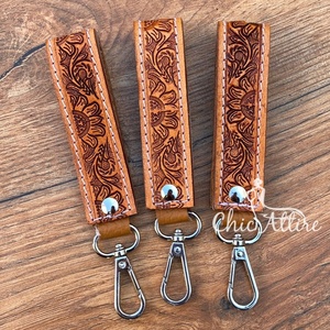 Porte-clés en cuir usiné à la main au design de luxe personnalisé en gros pour femmes porte-clés mousqueton en cuir de vachette de qualité supérieure - Product Image 1